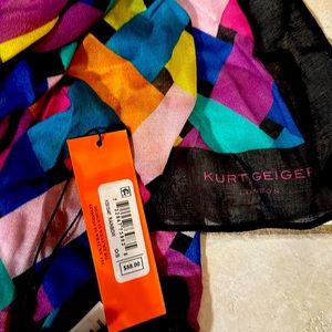 Colorful scarf to match the gloves.